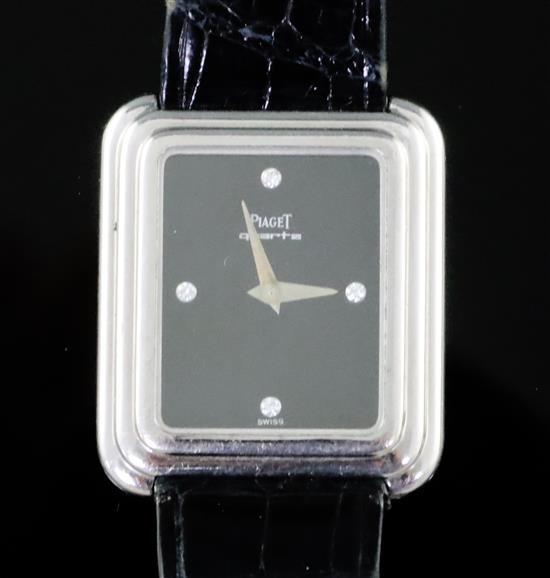 A ladys modern 18k white gold Piaget quartz rectangular wrist watch with diamond chip set dial,